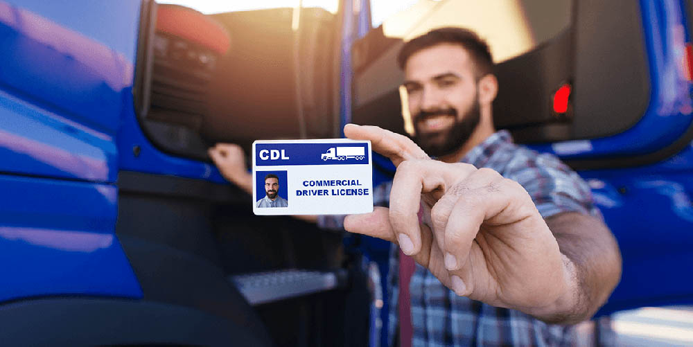 Student holding his CDL